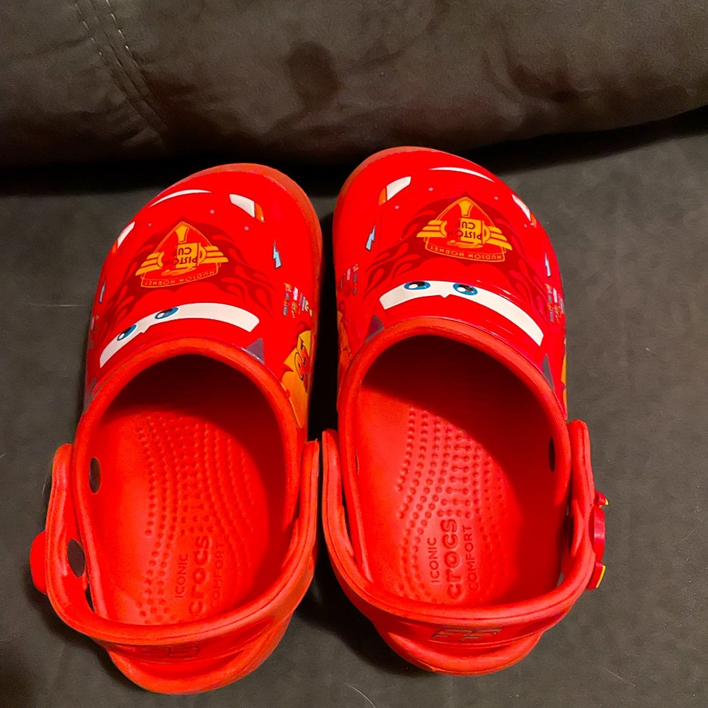 These are toddler size 10c Lightning McQueen crocs.